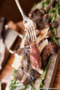 Seared sirloin with parmesan, truffles and rocket leaves