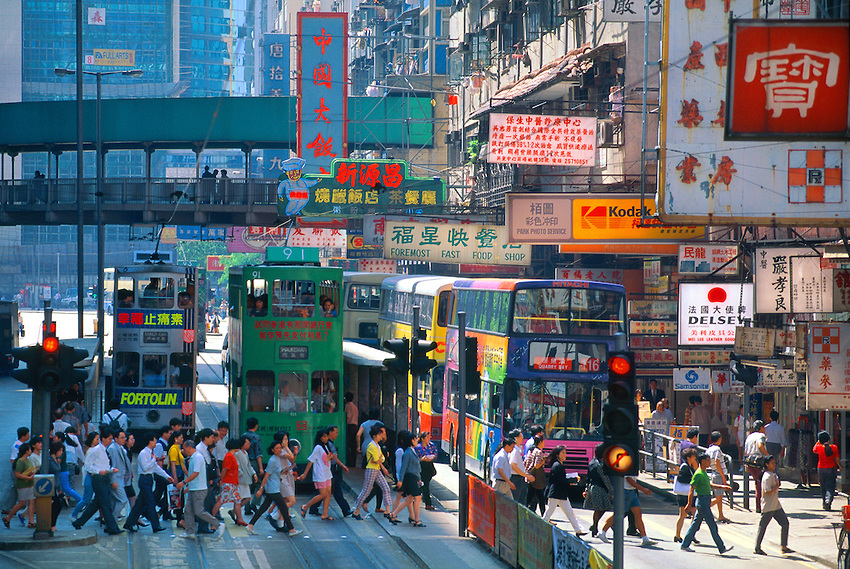 Pedestrians crossing street in the Central District, Hong Kong,